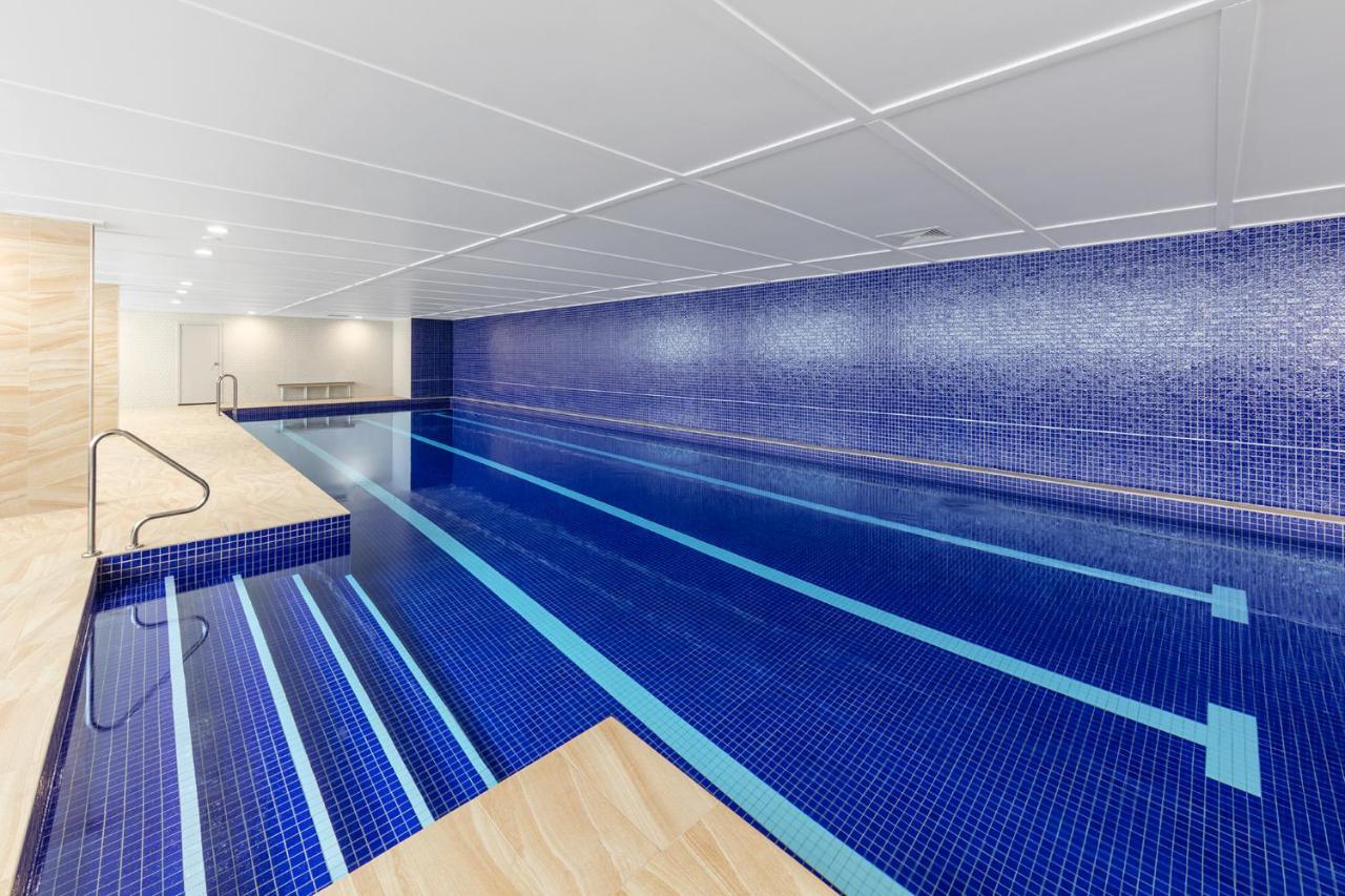 Meriton Suites Mascot Central Sydney Exterior photo The pool at the 2012 Commonwealth Games Village
