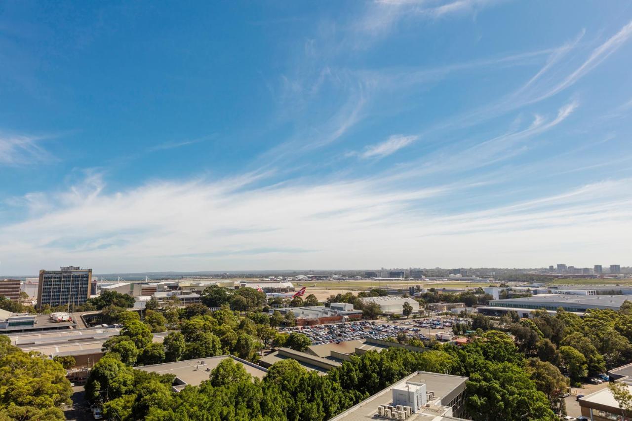 Meriton Suites Mascot Central Sydney Exterior photo View of the airport from the San Diego Marriott
