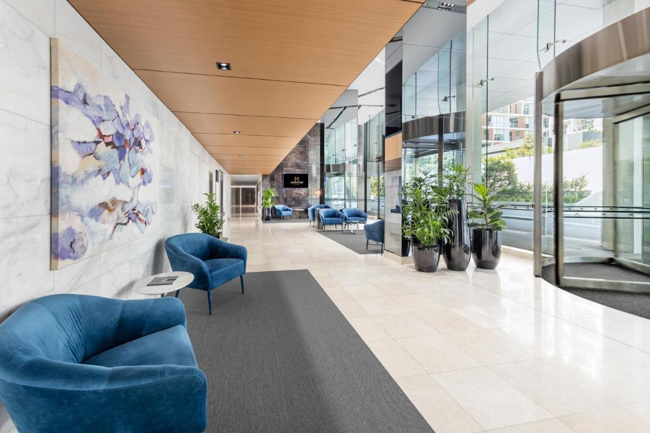 Meriton Suites Mascot Central Sydney Exterior photo The lobby of the hotel
